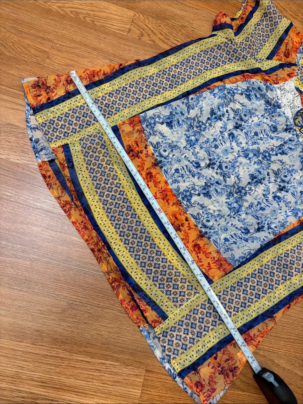 Fig & Flower blue, yellow & orange short sleeve semi-sheer top. Size M.